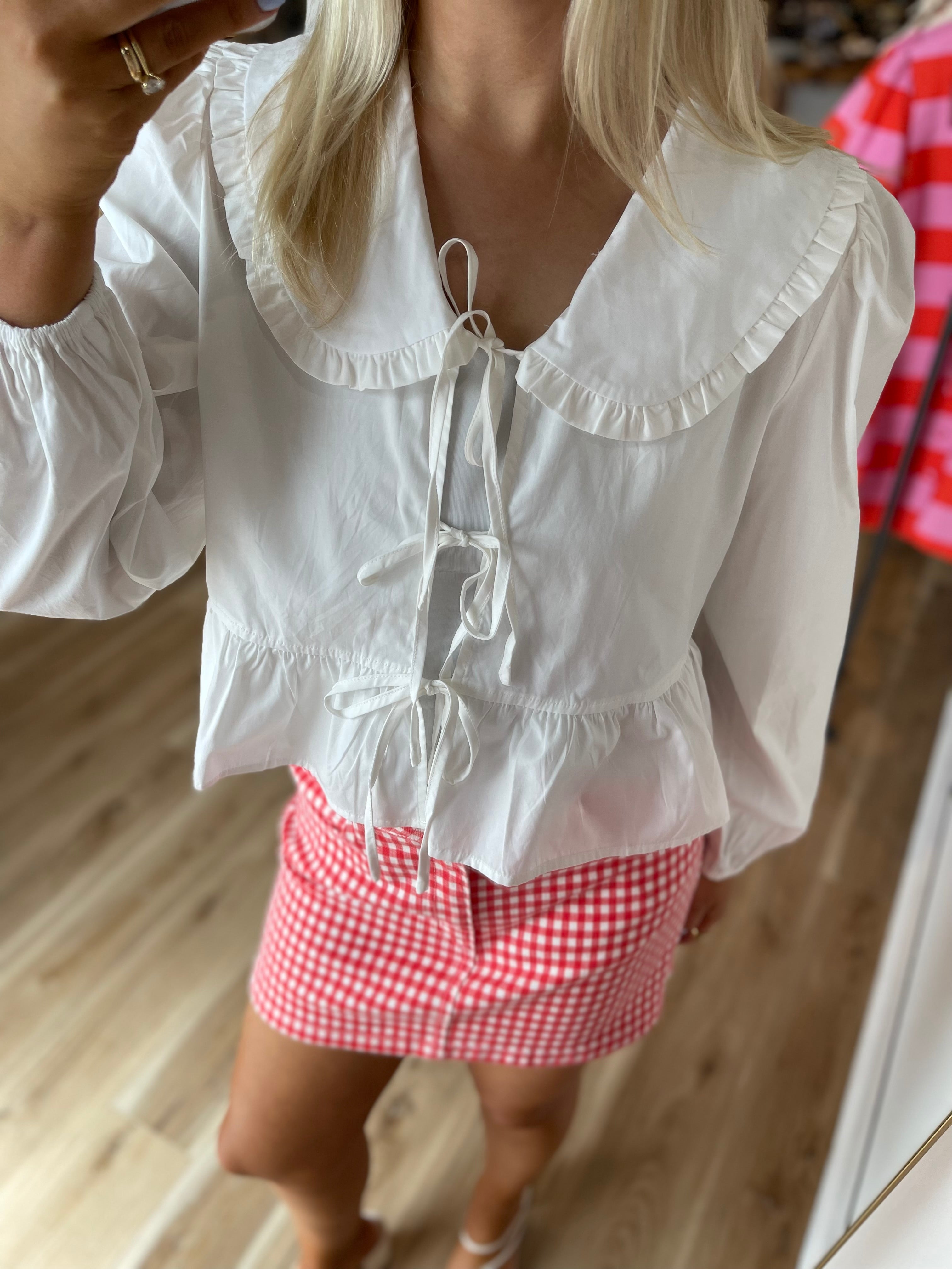 Remi Ruffle Front Tie Top